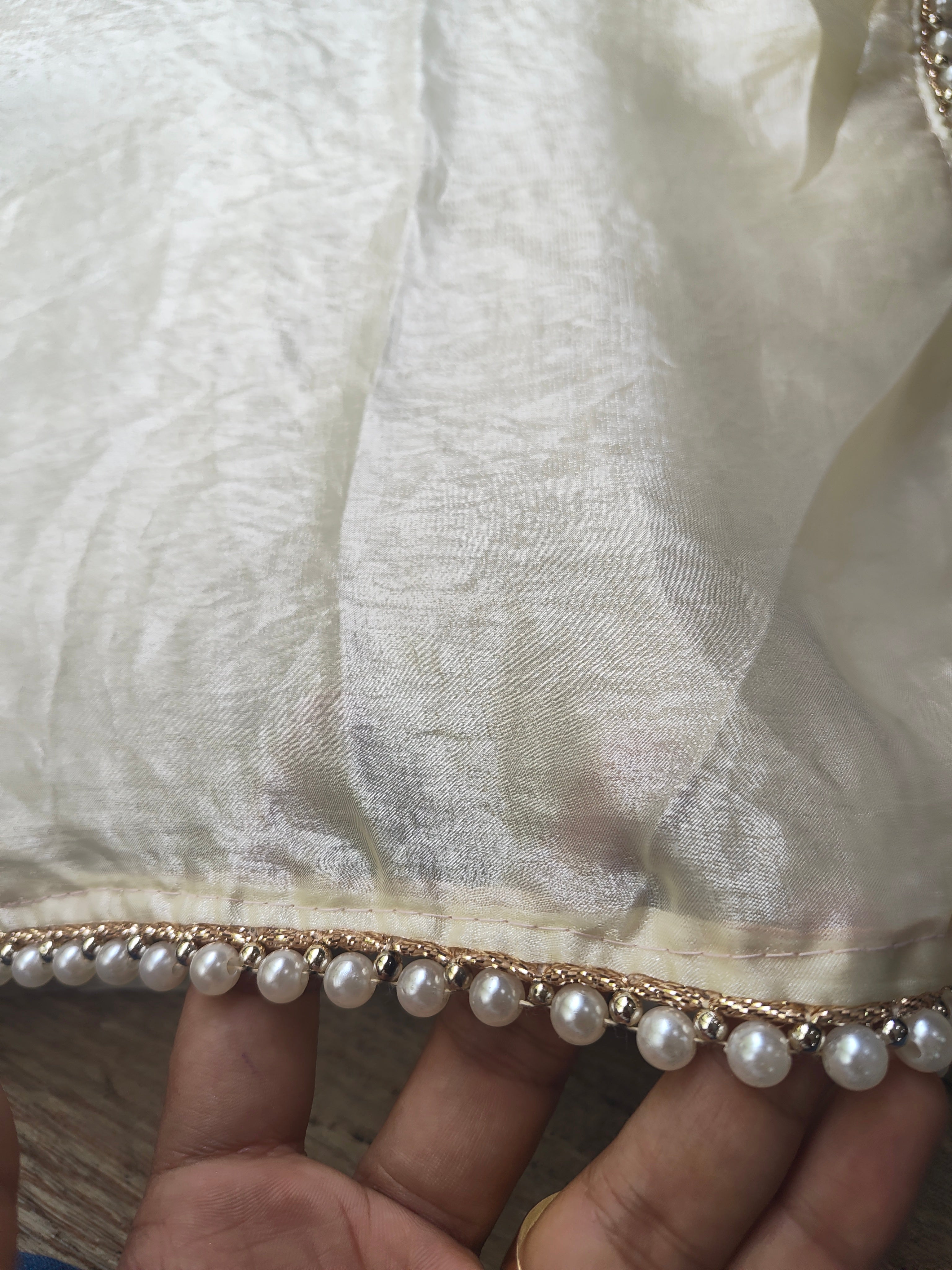 Cream Tissue Saree with Pearl Border (Copy)