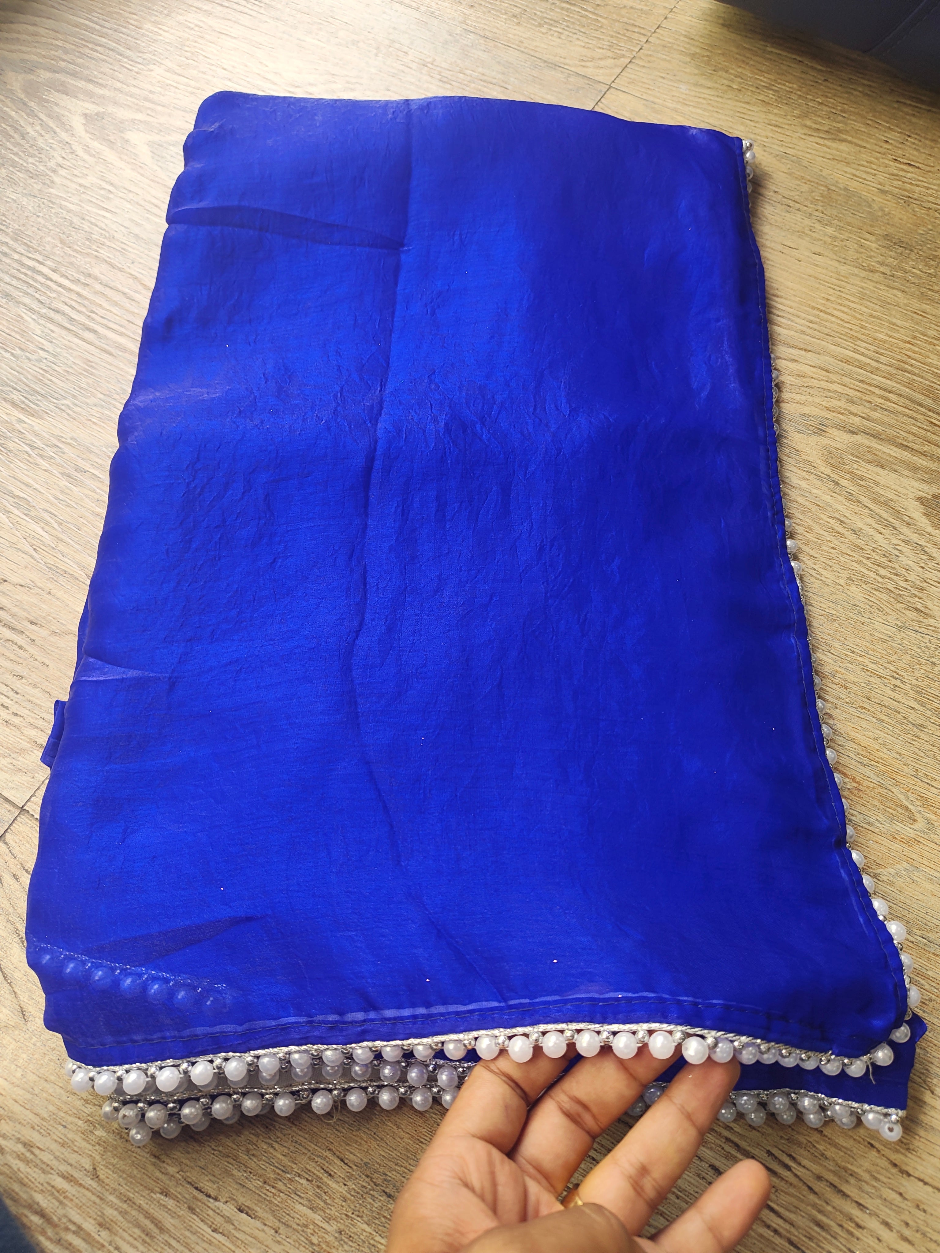 Blue Tissue Saree with Pearl Border